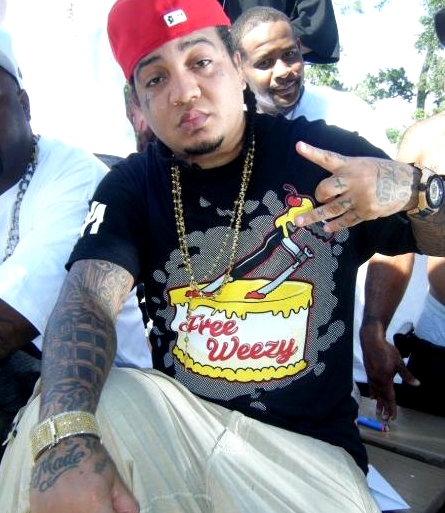 Gudda Gudda in 8&9 Clothing′s Free Weezy Tee Shirt